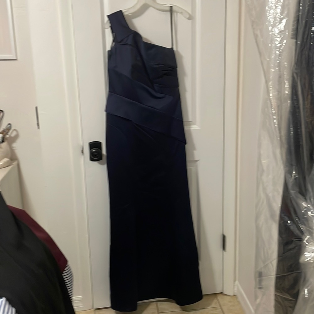 Vera Wang evening gown in navy blue. One should and built in bra. Size 10.